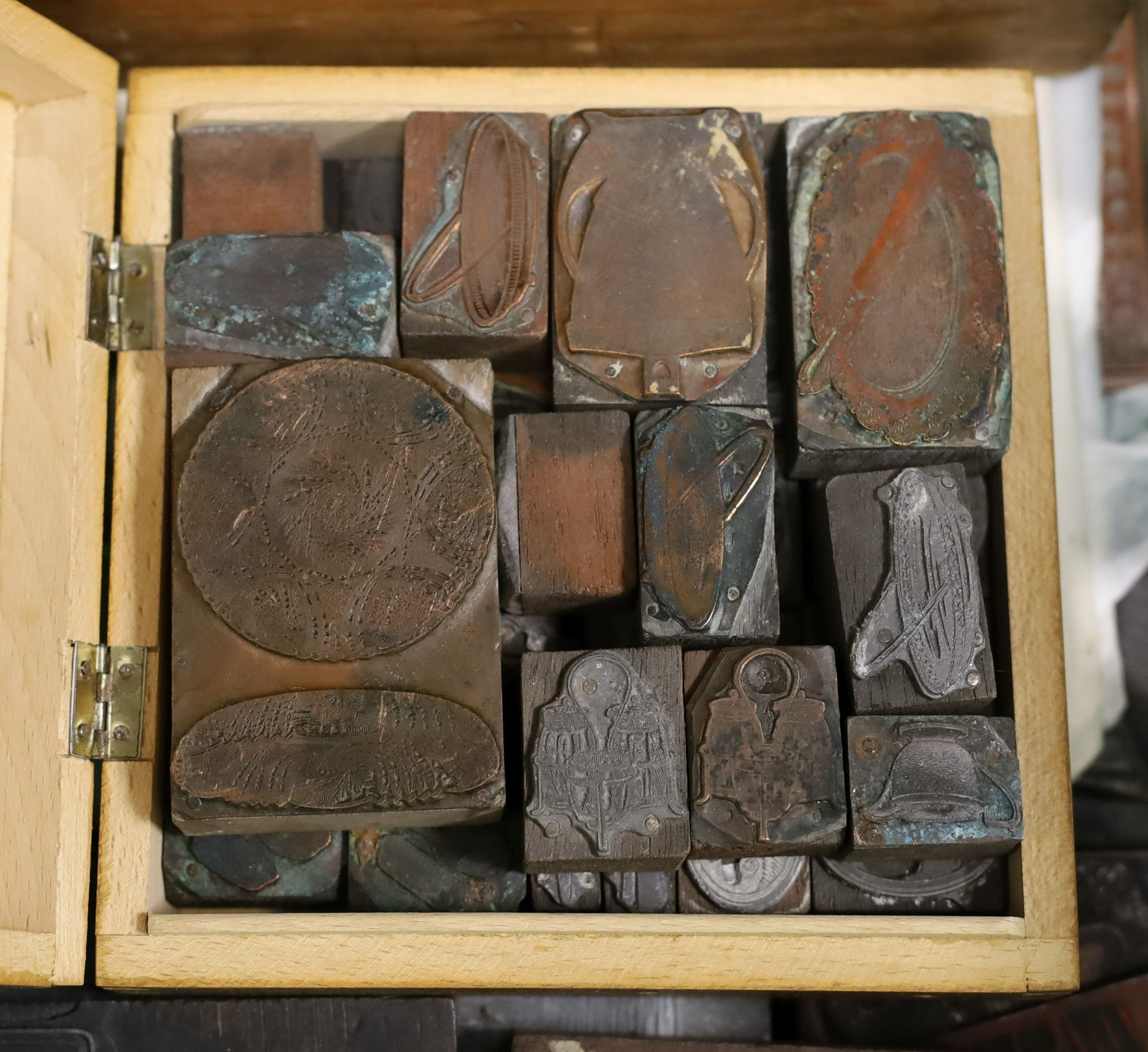 A quantity of decorative metal printing blocks, mainly 20th century examples